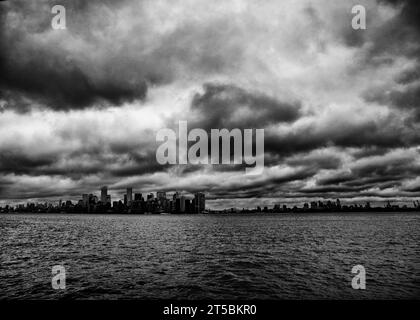 A high-quality stock photo of the iconic Manhattan skyline, one of the most recognizable skylines in the world. The photo captures the city's soaring Stock Photo