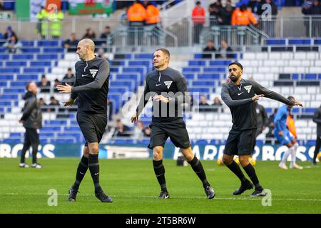 Birmingham, UK. 04th Nov, 2023. Assistant referee, Nigel Lugg, Referee, Leigh Doughty & Assistant referee, Bhupinder Singh Gill warming up taken during the EFL Sky Bet Championship match between Birmingham City and Ipswich Town at St Andrews, Birmingham, England on 4 November 2023. Photo by Stuart Leggett. Editorial use only, license required for commercial use. No use in betting, games or a single club/league/player publications. Credit: UK Sports Pics Ltd/Alamy Live News Stock Photo