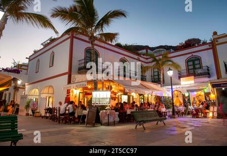 GRAN CANARIA, SPAIN - AUG 02, 2023: Restaurant close to the harbor of Puerto de Mogan on Canary Island Gran Canaria Stock Photo