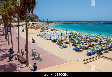 GRAN CANARIA, SPAIN - AUG 04, 2023: Playa de Amadorus is one of the most popular beaches on Canary Island Gran Canaria. Stock Photo