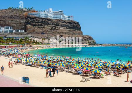 GRAN CANARIA, SPAIN - AUG 04, 2023: Playa de Amadorus is one of the most popular beaches on Canary Island Gran Canaria. Stock Photo