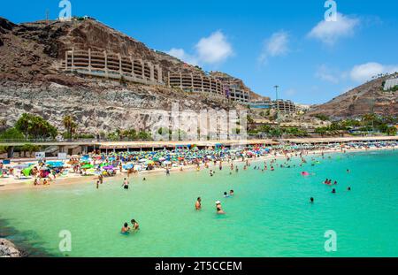 GRAN CANARIA, SPAIN - AUG 04, 2023: Playa de Amadorus is one of the most popular beaches on Canary Island Gran Canaria. Stock Photo