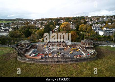 Grange-over-Sands, Cumbria, 4th November 2023 - The Grange-over-Sands Lido is currnetly under restoration work after years of battling to save the structure from the elements and dereliction. The North-West English outdoor pool was closed in the early 1990's due to a lack of visitors, but pressure has now grown to save the pool. Westmorland and Furness Council has stepped in to restore the main buildings and fill the pool with shale so if funds are raised, the pool can be dug out and opened again in the future. Credit: Stop Press Media/Alamy Live News Stock Photo