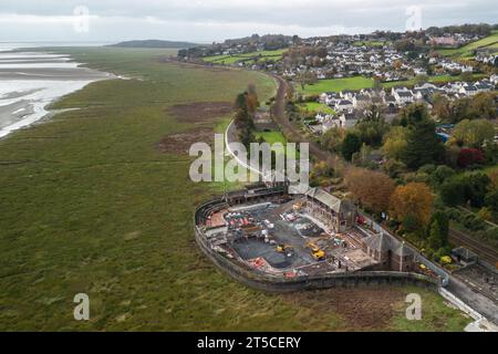 Grange-over-Sands, Cumbria, 4th November 2023 - The Grange-over-Sands Lido is currnetly under restoration work after years of battling to save the structure from the elements and dereliction. The North-West English outdoor pool was closed in the early 1990's due to a lack of visitors, but pressure has now grown to save the pool. Westmorland and Furness Council has stepped in to restore the main buildings and fill the pool with shale so if funds are raised, the pool can be dug out and opened again in the future. Credit: Stop Press Media/Alamy Live News Stock Photo