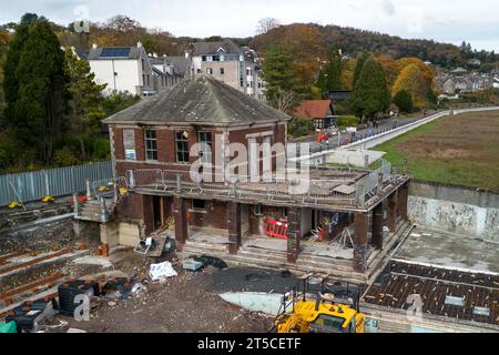 Grange-over-Sands, Cumbria, 4th November 2023 - The Grange-over-Sands Lido is currnetly under restoration work after years of battling to save the structure from the elements and dereliction. The North-West English outdoor pool was closed in the early 1990's due to a lack of visitors, but pressure has now grown to save the pool. Westmorland and Furness Council has stepped in to restore the main buildings and fill the pool with shale so if funds are raised, the pool can be dug out and opened again in the future. Credit: Stop Press Media/Alamy Live News Stock Photo