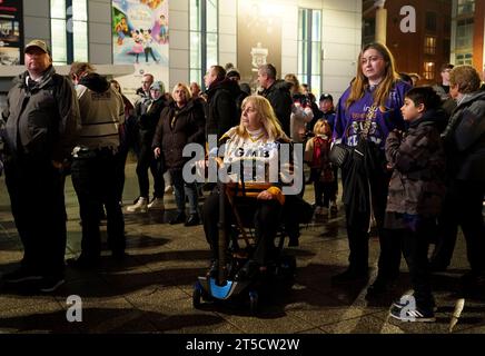 Fans gather outside the Motorpoint Arena, Nottingham, ahead of a memorial for Nottingham Panthers' ice hockey player Adam Johnson. Adam Johnson died after an accident during a Challenge Cup match with Sheffield Steelers last Saturday. Picture date: Saturday November 4, 2023. Stock Photo