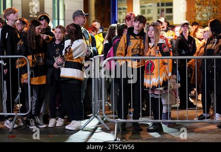 Fans gather outside the Motorpoint Arena, Nottingham, ahead of a memorial for Nottingham Panthers' ice hockey player Adam Johnson. Adam Johnson died after an accident during a Challenge Cup match with Sheffield Steelers last Saturday. Picture date: Saturday November 4, 2023. Stock Photo