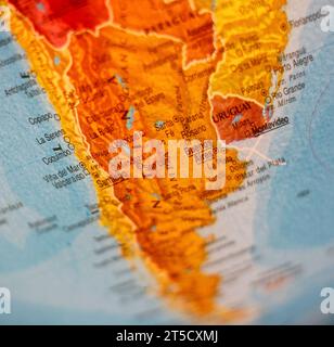 Closeup of illuminated toy globe focused on the south part of South America. Globe lamp focusing on the Southern Cone, Buenos Aires Stock Photo
