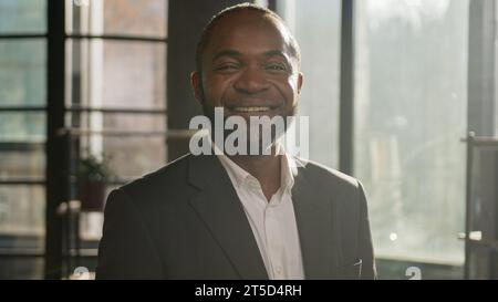Portrait professional middle-aged African American man smiling business entrepreneur leader banker employer mature happy ethnic businessman in Stock Photo