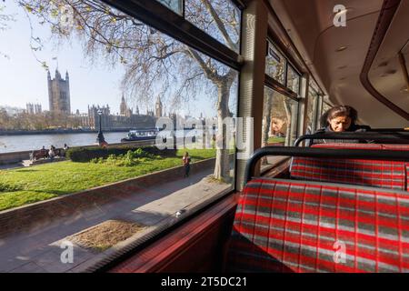Sadiq Khan to axe landmark bus route 11 a week before Coronation.   Pictured: The view of the Parliament from the side windows of a Bus 11 passing thr Stock Photo