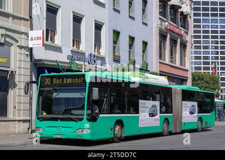 Basel, Switzerland - Green bus Mercedes-Benz Citaro in a street. Stock Photo