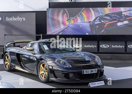 Paris, France - RM Sotheby's Paris 2020. Focus on a glittery black 2005 Porsche Gemballa Mirage GT Gold Edition. Chassis no. WP0ZZZ98Z5L000102. Stock Photo