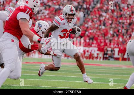 Piscataway, New Jersey, USA. 4th Nov, 2023. Ohio State Buckeyes running back TreVeyon Henderson (32) carries the ball during the game between the Ohio State Buckeyes and Rutgers Scarlet Knights at SHI Stadium, Piscataway, New Jersey. (Credit Image: © Scott Stuart/ZUMA Press Wire) EDITORIAL USAGE ONLY! Not for Commercial USAGE! Stock Photo