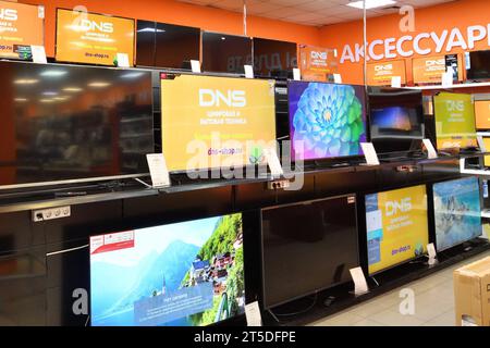 Moscow, Russia - Oct 19. 2023. TVs and and others in the DNS network store selling household appliances in Zelenograd Stock Photo