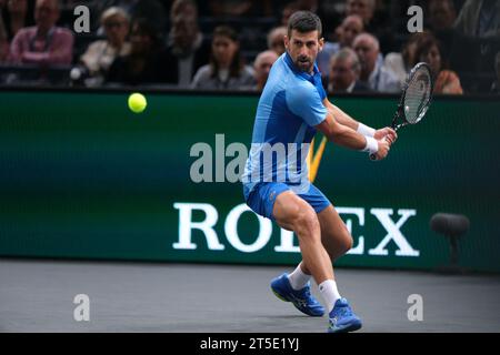 Paris, France. 4th Nov, 2023. Serbian player NOVAK DJOKOVIC returns the ball to Russian player A. RUBLEV during the semi final of Rolex Paris Masters 1000 tournament at Paris Accor Arena Stadium. (Credit Image: © Pierre Stevenin/ZUMA Press Wire) EDITORIAL USAGE ONLY! Not for Commercial USAGE! Credit: ZUMA Press, Inc./Alamy Live News Stock Photo