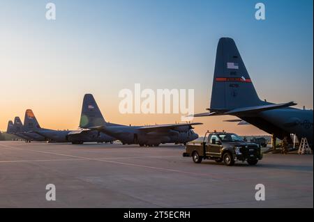 Three U.S. Air Force C-130J Super Hercules aircraft from the 37th Airlift Squadron, Ramstein Air Base, Germany, and two C-130 Hercules aircraft from the 182nd Airlift Wing, Illinois Air National Guard, sit on the flightline at 33rd Air Base, Poland, during Aviation Detachment Rotation 23-4, Sept. 13, 2023. Members of the 86th Airlift Wing, 435th Air Ground Operations Wing, and 182nd AW, Illinois Air National Guard, deployed to Poland to support Aviation Detachment Rotation 23-4. ADR is a bilateral training exercise with the Polish air force designed to enhance allied interoperability, maintain Stock Photo