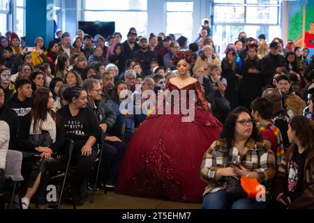 Seattle, Washington, USA. 4th November, 2023. A young woman participates in a Catrina fashion show at El Centro de la Raza’s annual Día de los Muertos celebration. Credit: Paul Christian Gordon/Alamy Live News Stock Photo