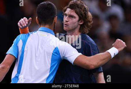 Paris, France. 4th Nov, 2023. Novak Djokovic (L) of Serbia hugs Andrey Rublev of Russia after their men's singles semi-final match at Paris ATP Masters 1000 tennis tournament in Paris, France, Nov. 4, 2023. Credit: Gao Jing/Xinhua/Alamy Live News Stock Photo