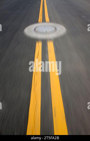yellow double solid line on the road Stock Photo