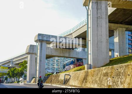 Detailed shot of a rectangular concrete structure in a highway's foundation. underneath the road Stock Photo