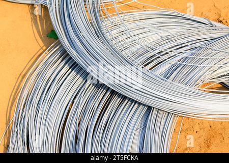 galvanized iron wire on the ground, closeup of photo Stock Photo