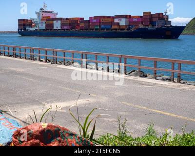Container ship Addison arriving at Durban Harbour. Stock Photo