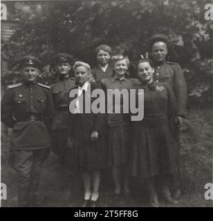 Vintage amateur group photo of happy Soviet military personnel after ww2,  Germany, 1946-1948 Stock Photo