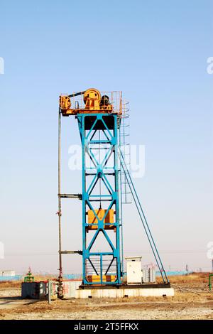 CAOFEIDIAN - DECEMBER 1: The frame type pumping unit in the JiDong oilfield, on December 1, 2013, caofeidian, hebei province, China. Stock Photo