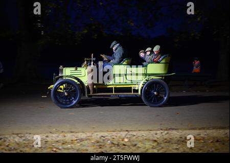 London, UK. 05th Nov, 2023. Vintage cars arriving before sunrise on Sunday, 5 November, London’s Hyde Park will be full of the sights, sounds and smells of the dawn of motoring, as 400 intrepid drivers ready themselves and their pioneering machines for the annual RM Sotheby’s London to Brighton Veteran Car Run.   Then, following the symbolic tearing up of the red flag, as the sun rises at 7:00am all the participants will set off on the historic 60-mile journey to the Sussex coast. Credit: Mary-Lu Bakker/Alamy Live News Stock Photo