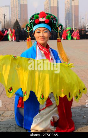 LUANNAN COUNTY - FEBRUARY 12: Young woman wearing colorful clothes ...