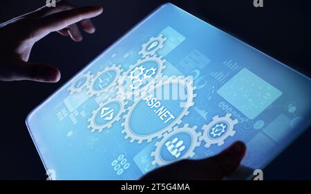 ASP.NET Development programming language concept on virtual screen. Stock Photo