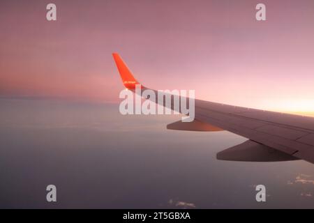 10 July 2022 - Seoul, South Korea : Jeju Air airplane on the sky with view of the land. It is the first and largest South Korean low-cost airline Stock Photo