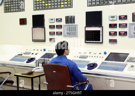LUANNAN - MAY 4: Technical personnel in the monitor equipment operation, in a thermal power plant, on May 4, 2014, Luannan county, hebei province, Chi Stock Photo