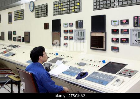 LUANNAN - MAY 4: Technical personnel in the monitor equipment operation, in a thermal power plant, on May 4, 2014, Luannan county, hebei province, Chi Stock Photo