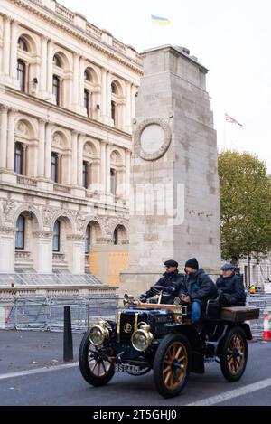 Westminster, London, UK. 5th Nov, 2023. The London to Brighton veteran car run is the longest-running motoring event in the world with the first taking place in 1896 organised to celebrate the passing of the law that enabled 'light locomotives' to travel at speeds greater than 4mph. Cars entering the event must have been built before 1905. Setting off at dawn from Hyde Park the vehicles travelled through London before heading south. 1901 Panhard et Levassor passing war memorial in Whitehall Stock Photo