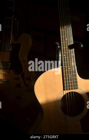 acoustic and electric guitars Stock Photo