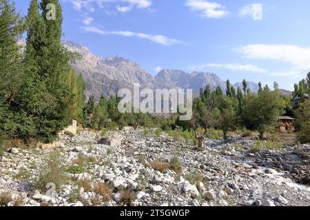river at the foot of the waterfall near Arslanbob, Kyrgyzstan, Central Asia Stock Photo