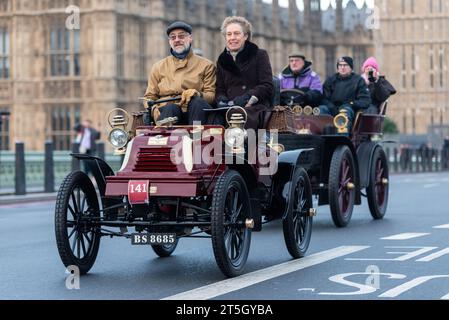 Westminster, London, UK. 5th Nov, 2023. The London to Brighton veteran car run is the longest-running motoring event in the world with the first taking place in 1896 organised to celebrate the passing of the law that enabled 'light locomotives' to travel at speeds greater than 4mph. Cars entering the event must have been built before 1905. Setting off at dawn from Hyde Park the vehicles travelled through London before heading south. 1903 Crestmobile Stock Photo