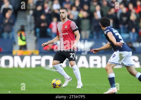 London, UK. 04th Nov, 2023. Southampton defender Taylor Harwood-Bellis (21) during the Millwall FC v Southampton FC sky bet EFL Championship match at The Den, London, England, United Kingdom on 4 November 2023 Credit: Every Second Media/Alamy Live News Stock Photo