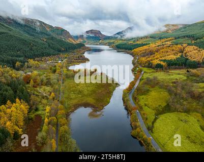 Aerial view of autumn colours beside the Garbh Uisge river and Loch Lubnaig  in The Trossachs, Scotland, Uk Stock Photo