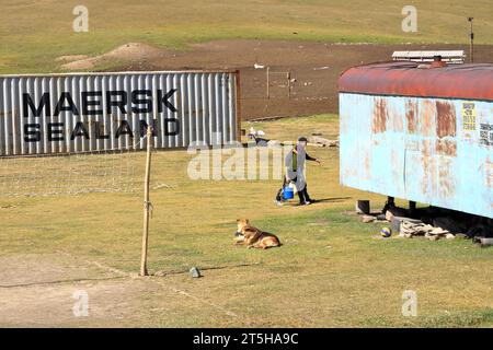 August 20 2023 - Kyrgyzstan in Central Asia: people milking mare to obtain milk for kumis at the Ala-Bel-Pass Stock Photo