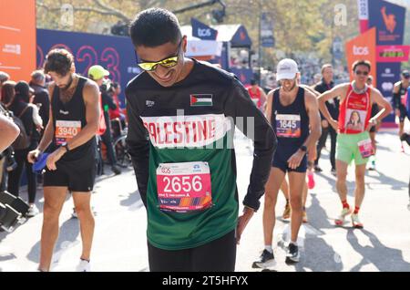 New York, United States. 05th Nov, 2023. A runner wears a Palestine shirt competing at the 2023 NYRR TCS New York City Marathon in New York City on Sunday, November 5, 2023. Over 50,000 runners from New York City and around the world race through the five boroughs on a course that winds its way from the Verrazano Bridge before crossing the finish line by Tavern on the Green in Central Park. Photo by John Angelillo/UPI Credit: UPI/Alamy Live News Stock Photo