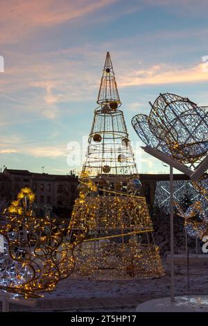 Christmas decorations on Place Jean-Jaures by night. Occitanie, France Stock Photo
