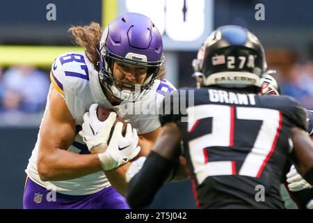 Minnesota Vikings tight end T.J. Hockenson (87) runs on the