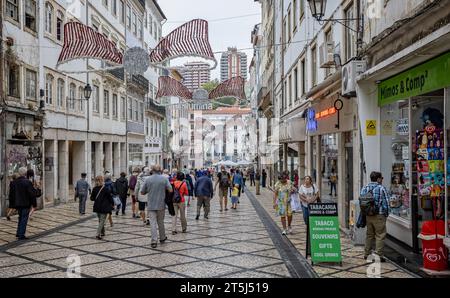 Visconde da Luz street, Coimbrfa's main pedestrain shopping street in Coimbra, Portugal on 13 October 2023 Stock Photo