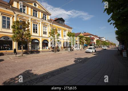 EKSJÖ, SWEDEN ON MAY 16, 2018. Exterior small-town buildings. Wooden or plaster wall. Unidentified people. Editorial use. Stock Photo