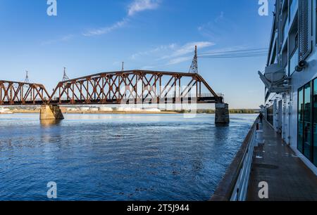 Dubuque Railroad bridge opens to allow river cruise boat to pass on Upper Mississippi in Dubuque Iowa Stock Photo