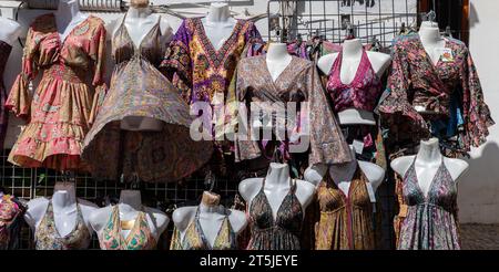 Granada, Spain; August-23, 2023: Women's dresses for sale in a Moorish shop on a street in Albaicin (Granada, Spain) Stock Photo
