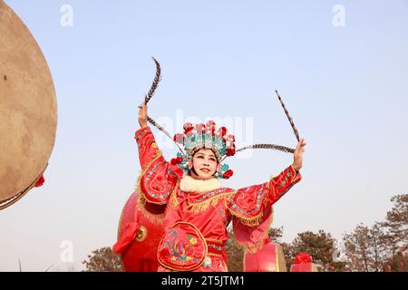 Tangshan City - February 20, 2018: Peking opera characters in the park, Tangshan City, Hebei, China Stock Photo