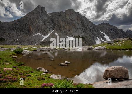 WY05620-00...WYOMING - Small tarn on the ridge between Temple and Deep Lakes in the Bridger Wilderness area of the Wind River Range. Stock Photo